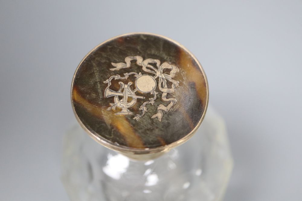 Three various tortoiseshell and silver pique-mounted glass toilet jars and a small silver circular box